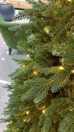 Each branch of the Christmas tree features distinct leaves, meticulously designed to create a natural look. This close-up reveals the attention to detail that makes this tree a standout piece in your holiday decor.