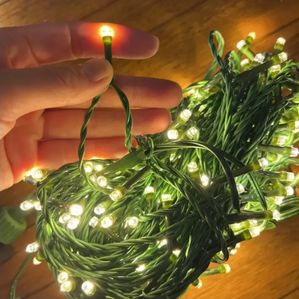 Once powered on, the green hidden light string emits a cozy warm white light, perfectly designed to blend into tree branches for an elegant holiday glow.