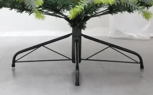 The Christmas tree rests on a durable black metal base with four legs, ensuring stability and support. This robust foundation guarantees that your tree stands tall and secure throughout the holiday season.